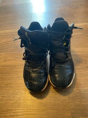 Kids Black Athletic Sneakers with Lace-Up Closure and spikes